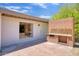 Backyard patio features a brick barbecue area, perfect for outdoor entertaining and dining at 4032 E Cannon Dr, Phoenix, AZ 85028