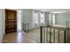 Inviting entryway with tile flooring, natural light, and staircase featuring decorative metal railing at 4032 E Cannon Dr, Phoenix, AZ 85028