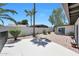 A brick paver patio and desert landscaping make for a cozy backyard at 4079 E Yucca St, Phoenix, AZ 85028