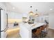 Bright, updated kitchen with a large island, counter seating, and modern appliances at 4079 E Yucca St, Phoenix, AZ 85028