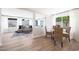 Open concept living areas featuring dining, living, and kitchen spaces with modern decor and bright natural light at 4079 E Yucca St, Phoenix, AZ 85028