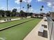 Community bocce ball courts showcase manicured playing field and comfortable bench seating at 4151 E Clovis Ave, Mesa, AZ 85206