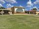 Sunland Village community center featuring a stage and open green space at 4151 E Clovis Ave, Mesa, AZ 85206