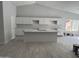 Bright kitchen with white cabinets, an island and modern countertops at 4219 E Whitney Ln, Phoenix, AZ 85032