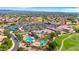 Aerial view showcasing the community amenities with pool, tennis, and the clubhouse amidst lush landscaping at 4239 E Azalea Dr, Gilbert, AZ 85298