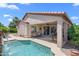 Relaxing covered patio and pristine pool for outdoor living and entertaining at 4239 E Azalea Dr, Gilbert, AZ 85298