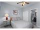 Cozy bedroom with a ceiling fan and framed art at 4239 E Azalea Dr, Gilbert, AZ 85298