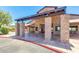 Entrance to community building with stone pillars and covered entry way at 4239 E Azalea Dr, Gilbert, AZ 85298