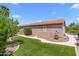 Charming home exterior with manicured lawn, tiled roof, and lush landscaping at 4239 E Azalea Dr, Gilbert, AZ 85298
