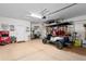 Spacious garage featuring a golf cart and room for parking at 4239 E Azalea Dr, Gilbert, AZ 85298