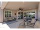 Relaxing covered patio with comfortable seating and views of the backyard at 4239 E Azalea Dr, Gilbert, AZ 85298
