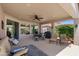 Covered patio with outdoor seating and a BBQ grill perfect for entertaining at 4239 E Azalea Dr, Gilbert, AZ 85298