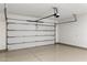 Spacious two-car garage with epoxy flooring and an automatic door opener at 4301 E Sells Dr, Phoenix, AZ 85018