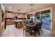 Open concept kitchen featuring a dining area and access to the outdoor pool area at 4437 E Dartmouth St, Mesa, AZ 85205