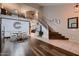 Inviting Living space with a large staircase, wood floors, and modern decor at 4437 E Dartmouth St, Mesa, AZ 85205