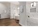 Bright bathroom with a freestanding tub, and a walk-in shower with tile surround at 4667 E Reins Rd, Gilbert, AZ 85297