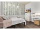 Cozy bedroom with a twin bed, decorative ivy, and desk at 4667 E Reins Rd, Gilbert, AZ 85297