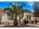 Close up of the home's exterior detailing unique architectural features and desert landscaping at 4667 E Reins Rd, Gilbert, AZ 85297