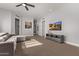 Bright and spacious living room with ample natural light, neutral tones, and a comfortable seating area at 4667 E Reins Rd, Gilbert, AZ 85297