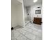 Bathroom featuring marble tile flooring, updated vanity, and a tiled walk-in shower at 4916 W Earll Dr, Phoenix, AZ 85031