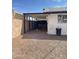 Covered parking area next to the home provides convenient and protected parking at 4916 W Earll Dr, Phoenix, AZ 85031
