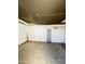 Spacious room with pegboard walls, offering versatile storage and organization options at 4916 W Earll Dr, Phoenix, AZ 85031