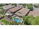 Aerial view of a home showcasing its pool, outdoor living spaces, and well-manicured surroundings at 5303 W Hackamore Dr, Phoenix, AZ 85083