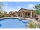 Beautiful backyard with pool, patio, and grassy area at 5303 W Hackamore Dr, Phoenix, AZ 85083