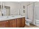 Neutral bathroom with a large mirror and a shower/tub combo at 5303 W Hackamore Dr, Phoenix, AZ 85083