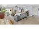 Comfortable living room featuring a large sectional and natural light at 5303 W Hackamore Dr, Phoenix, AZ 85083