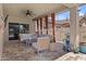 Inviting covered patio featuring stylish furniture and a peaceful ambiance at 5303 W Hackamore Dr, Phoenix, AZ 85083