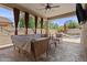 Cozy covered patio with an outdoor seating area and poolside views at 5303 W Hackamore Dr, Phoenix, AZ 85083