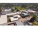Aerial view of educational buildings with a nearby green sports field and parking, showing the educational facilities at 5808 W Myrtle Ave, Glendale, AZ 85301