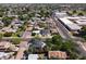 The home's location is captured from an aerial view in a residential neighborhood at 5808 W Myrtle Ave, Glendale, AZ 85301