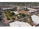 Aerial view of a building under construction with a grassy area and nearby parking at 5808 W Myrtle Ave, Glendale, AZ 85301