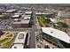 Aerial view of a street with buildings and parking lots, showcasing the neighborhood's layout and accessibility at 5808 W Myrtle Ave, Glendale, AZ 85301
