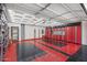 Well-organized garage with custom storage solutions and striking floor design at 5905 N Echo Canyon Ln, Phoenix, AZ 85018