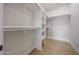 Spacious walk-in closet with built-in shelving and ample storage for clothes and accessories at 6126 E Charter Oak Rd, Scottsdale, AZ 85254