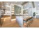 Spacious modern kitchen featuring a large marble island, stainless steel appliances, and stylish pendant lighting at 6126 E Charter Oak Rd, Scottsdale, AZ 85254