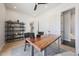 Office space with wood table and area rug, perfect for a home workspace at 6126 E Charter Oak Rd, Scottsdale, AZ 85254