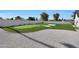 Spacious putting green with sand traps and ample space for putting practice at 6126 E Charter Oak Rd, Scottsdale, AZ 85254