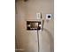 Electrical outlets and water hook-ups for laundry machines are visible on the wall at 614 W 12Th St, Casa Grande, AZ 85122