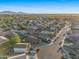 Expansive aerial view of a vibrant community with well-maintained homes under a clear sky at 6309 W Hughes Dr, Phoenix, AZ 85043