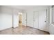 Bright bedroom with tile floors and a closet with sliding doors at 6309 W Hughes Dr, Phoenix, AZ 85043