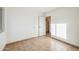 Bright bedroom with tile floors and a closet with sliding doors at 6309 W Hughes Dr, Phoenix, AZ 85043