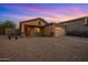 Charming single-Gathering home with desert landscaping, a two-car garage, and a welcoming entrance at 6309 W Hughes Dr, Phoenix, AZ 85043