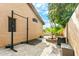 Backyard workout area with weightlifting equipment and desert landscaping near the pool at 6713 E Paradise Ln, Scottsdale, AZ 85254