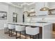 Elegant kitchen with a large island, white countertops, and stylish seating at 7001 E Joan De Arc Ave, Scottsdale, AZ 85254