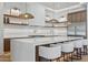 Beautiful modern kitchen featuring a large island with white countertops and seating at 7001 E Joan De Arc Ave, Scottsdale, AZ 85254