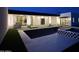 Outdoor pool area with modern patio and backyard with integrated lighting and design at 7001 E Joan De Arc Ave, Scottsdale, AZ 85254